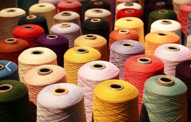 China Colorful TFO 40/2 Plastic Core Dyed Polyester Yarn / Thread For Sewing Machine supplier
